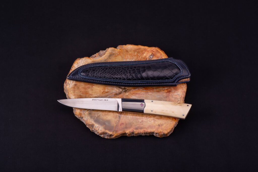 coltello d’autore: avorio fossile-titanio